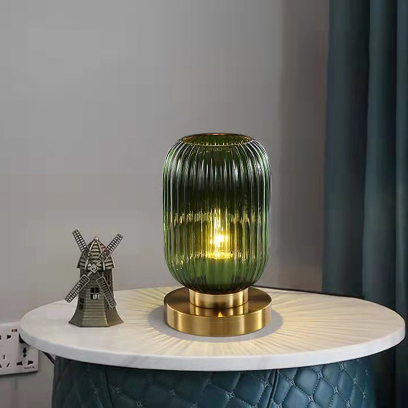 Cylindrical table lamp in coloured glass with gold base Quinn