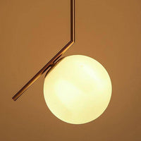 Gold LED pendant with globe lamp