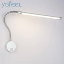 LED table lamp with adjustable arm