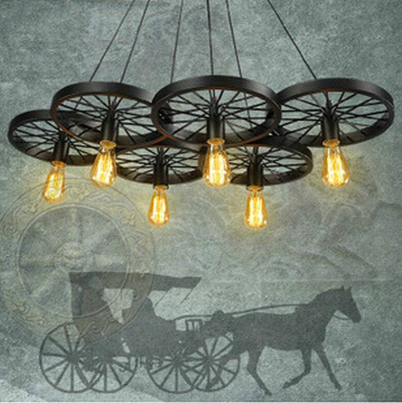 Antique rustic wheel pendant light with exposed bulbs
