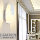 Modern rounded white LED designer wall light