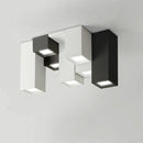 Geometric LED ceiling light with black and white rectangular tubes