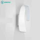 Modern rounded white LED designer wall light