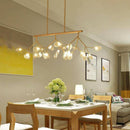 Modern designer LED chandelier with wooden tree branches (black or gold)