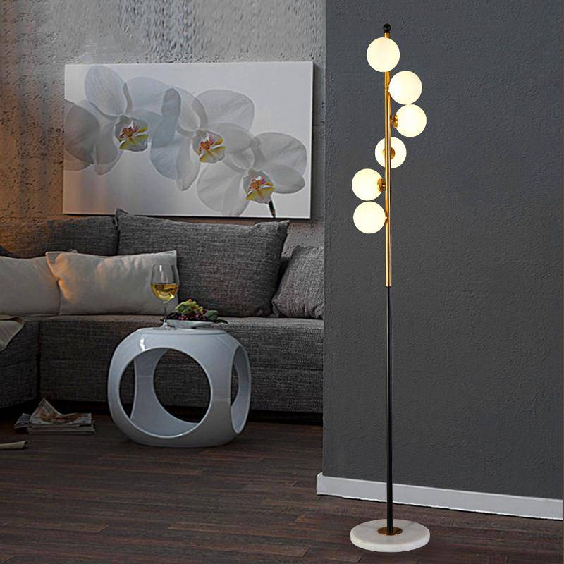 Modern designer gold glass globe LED floor lamp