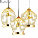 Gold LED pendant light with caged bird