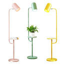 Modern LED floor lamp with colourful side table