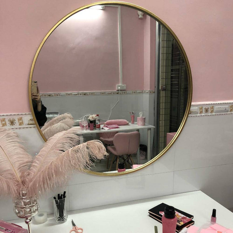 European round gold wall mirror