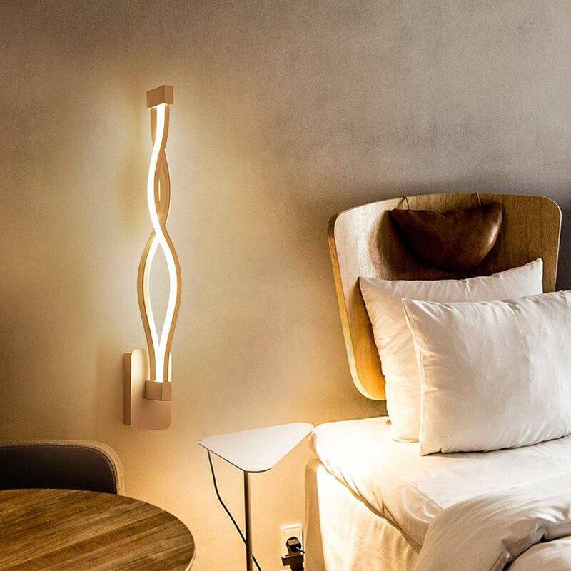 Modern LED wall light with curved metal design