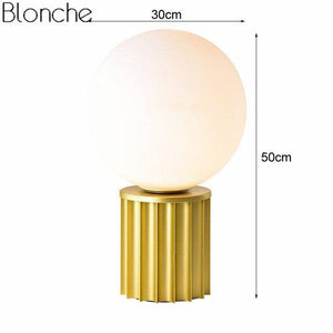 Lampe à poser design en métal doré avec boule blanche LED
