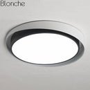 Art-style rounded LED ceiling light in designer colours