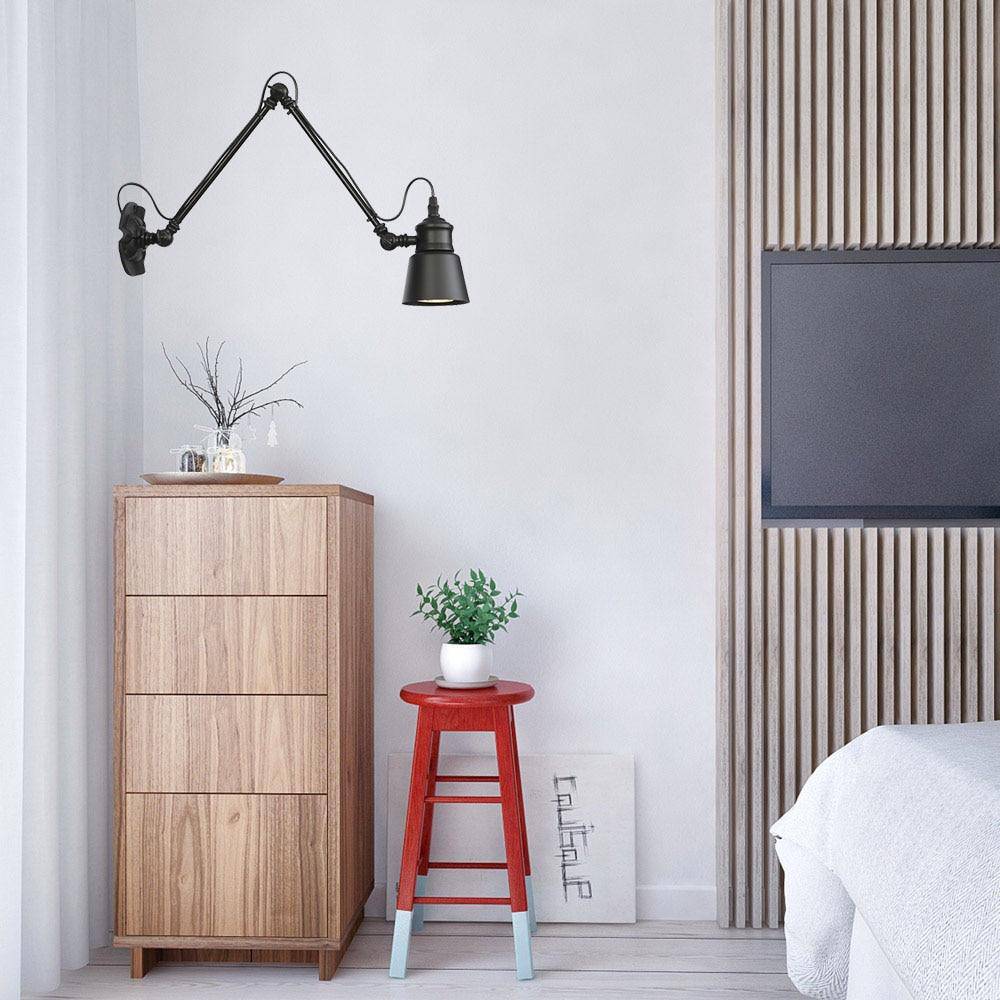 Antique wall light with articulated arm Beside