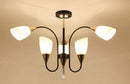 LED chandelier with curved arms and glass lamps for living room