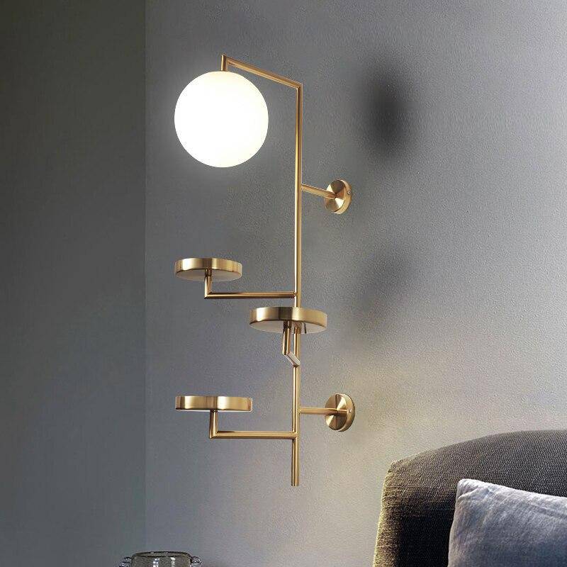 Modern LED wall light with multiple gold discs and glass sphere - vue 3 sur 6