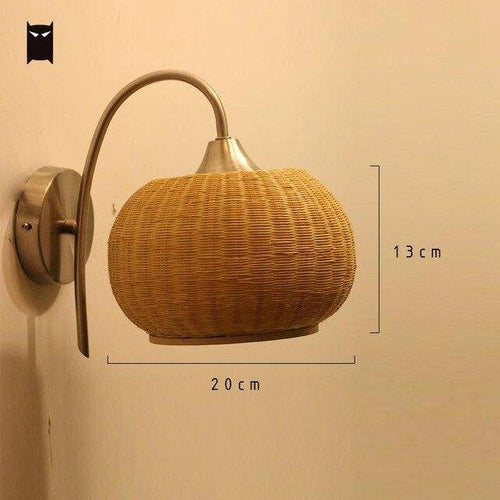 LED rattan wall sconce with rounded shade