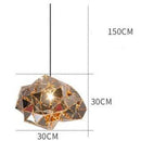 Designer pendant light with multiple small triangle shapes sparks