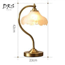 Golden table lamp with glass shade copper