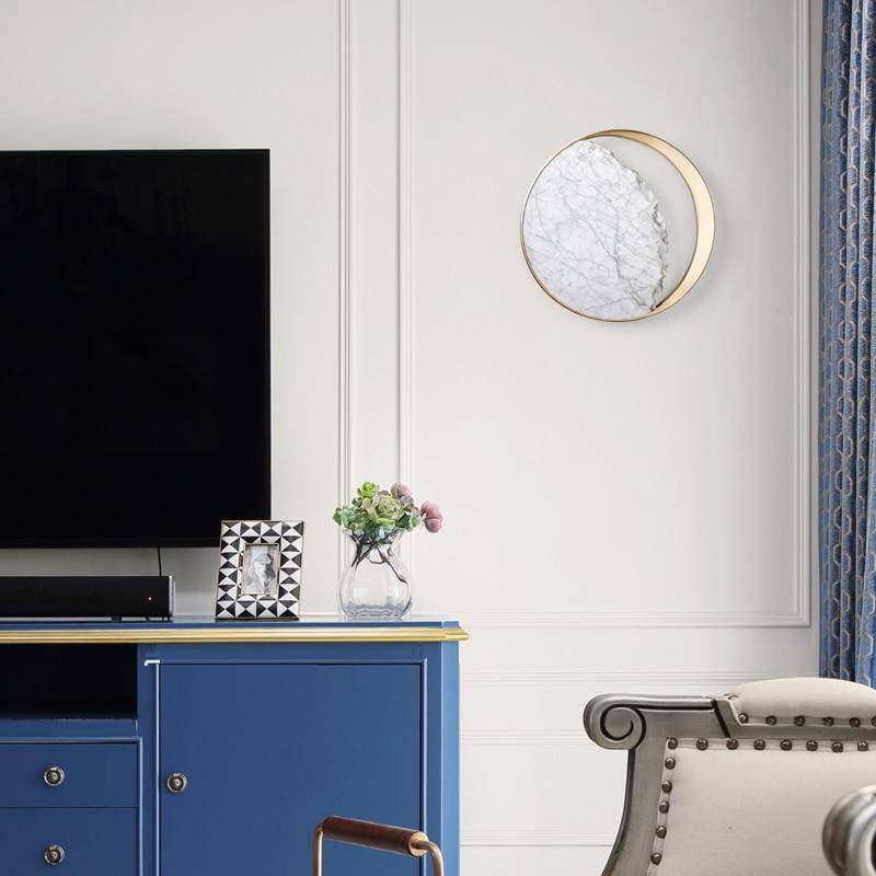 Designer LED wall light with marble and gold round detail